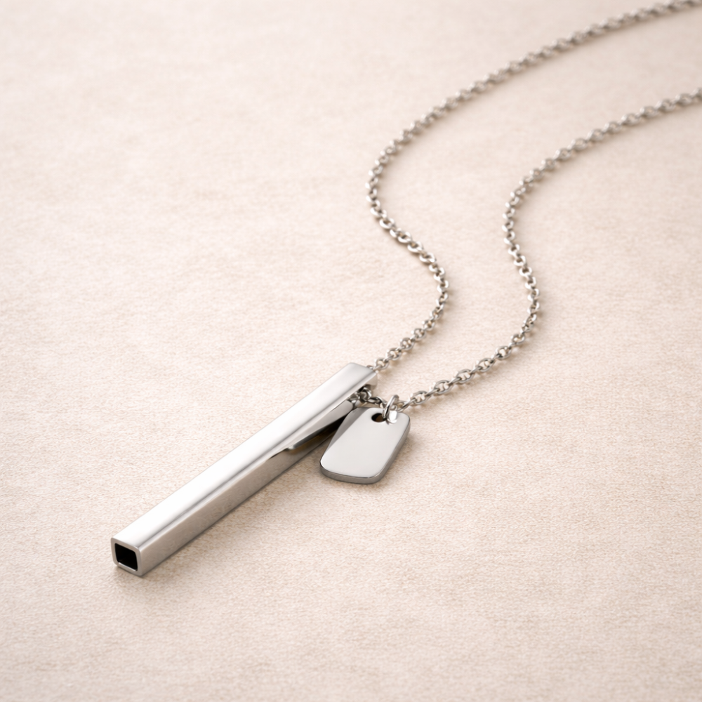 beprana silver breathing necklace with vertical bar pendant on neutral background