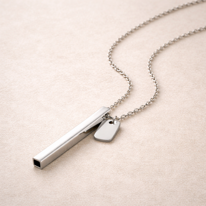 beprana silver breathing necklace with vertical bar pendant on neutral background