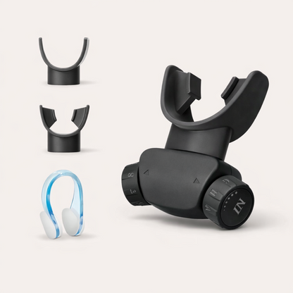 Adjustable matte black breathing trainer with dual resistance system, suction nozzle, bite tip and nose clip accessories on soft neutral background.